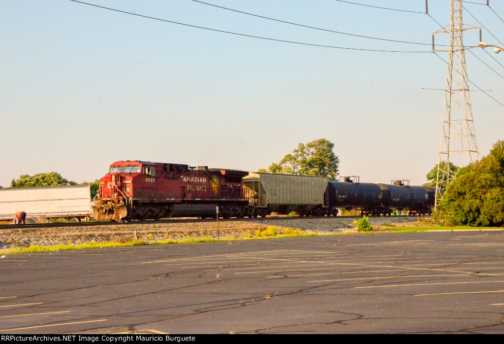 CP AC44CW Locomotive leading a train